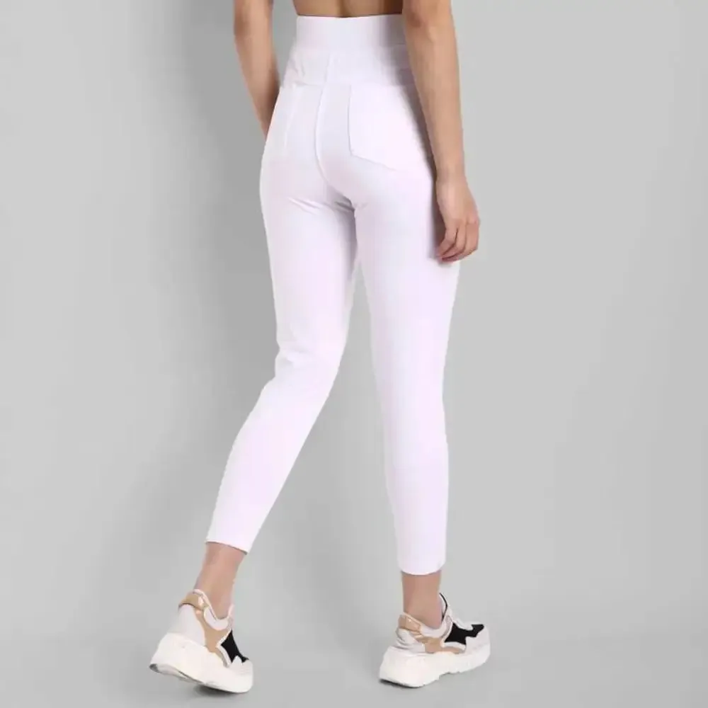 Alluring White Lycra Solid Skinny Fit Jeggings For Women